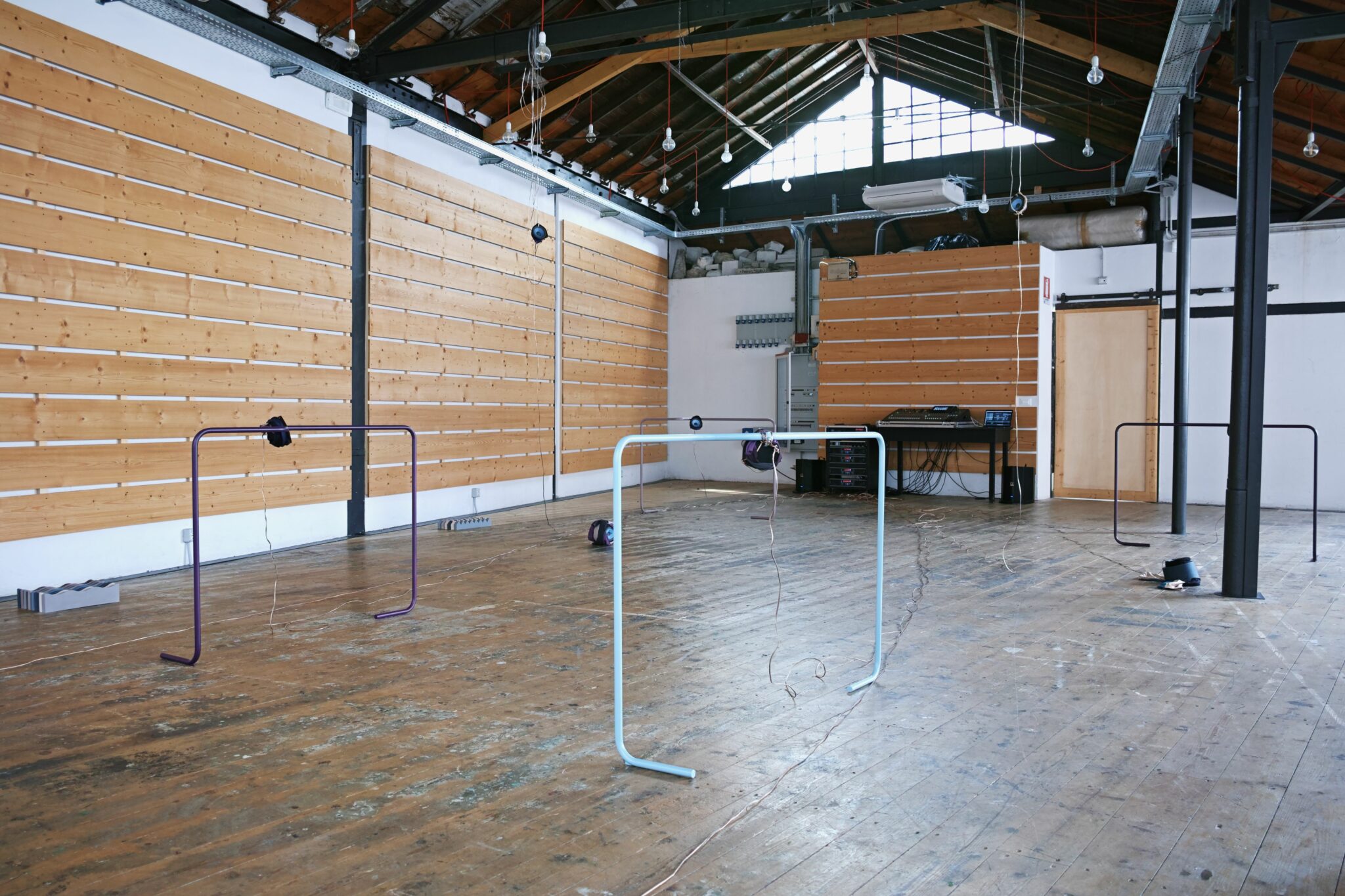 10 channel 3D sound installation, powder-coated bent metal structures, audio cables, sub-woofer, 5 amplifiers, Jesmonite, Lycra, Polyester and fleece fabric, urban debris